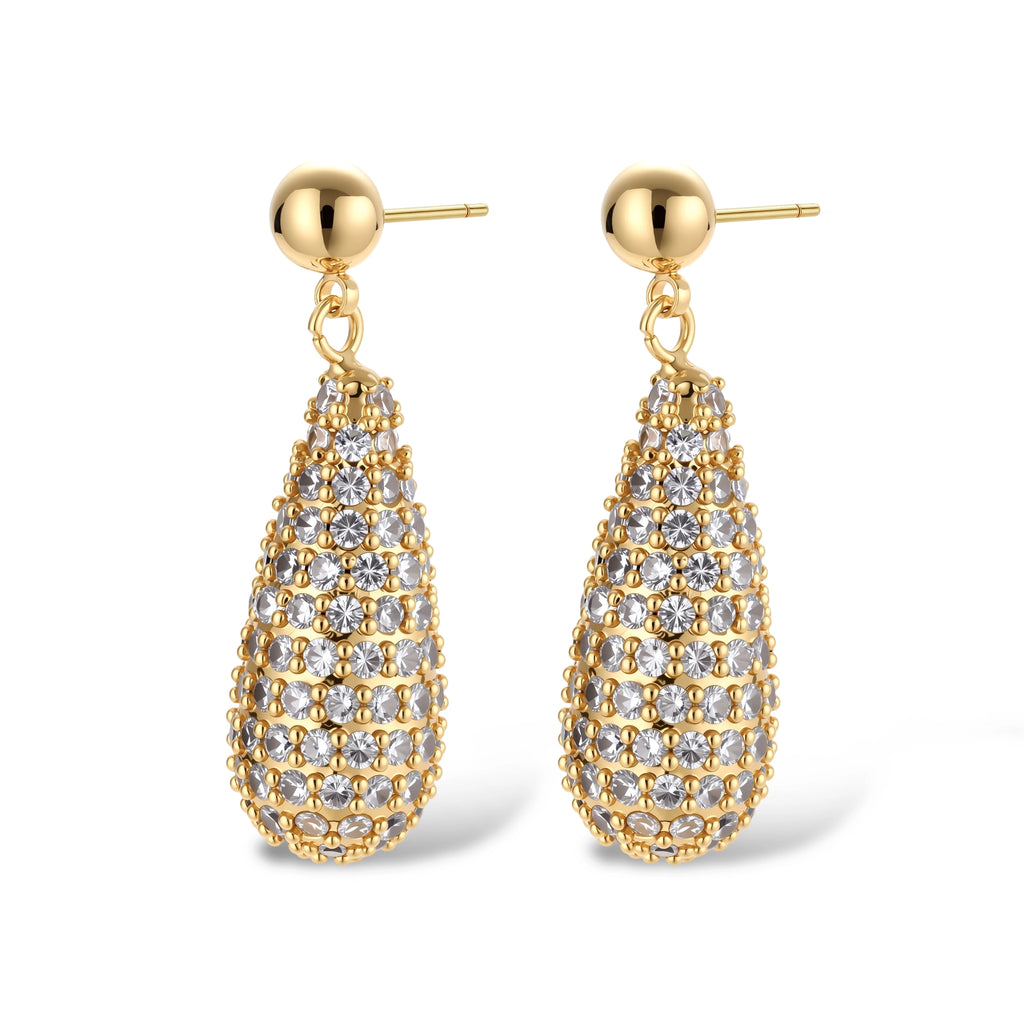 Gold-plated teardrop necklace and earrings covered in AAA cubic zirconia crystals on cream background.