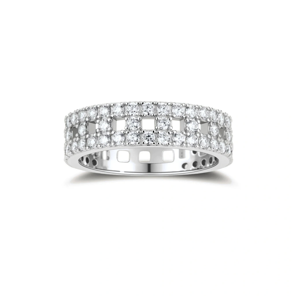Wide sterling silver ring with three rows of brilliant moissanite stones in geometric pavé setting on white background