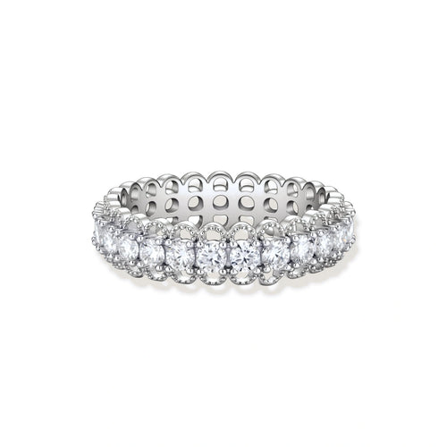 Sterling silver eternity ring with continuous row of brilliant moissanite stones in scalloped crown setting with milgrain detail