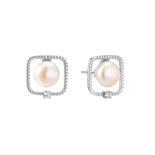 Rhodium-plated silver stud earrings with cushion frame, centered freshwater pearl, and tiny crystal accent