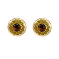 Round hammered gold studs with brown tiger's eye center surrounded by olive green liuli stones on white background.