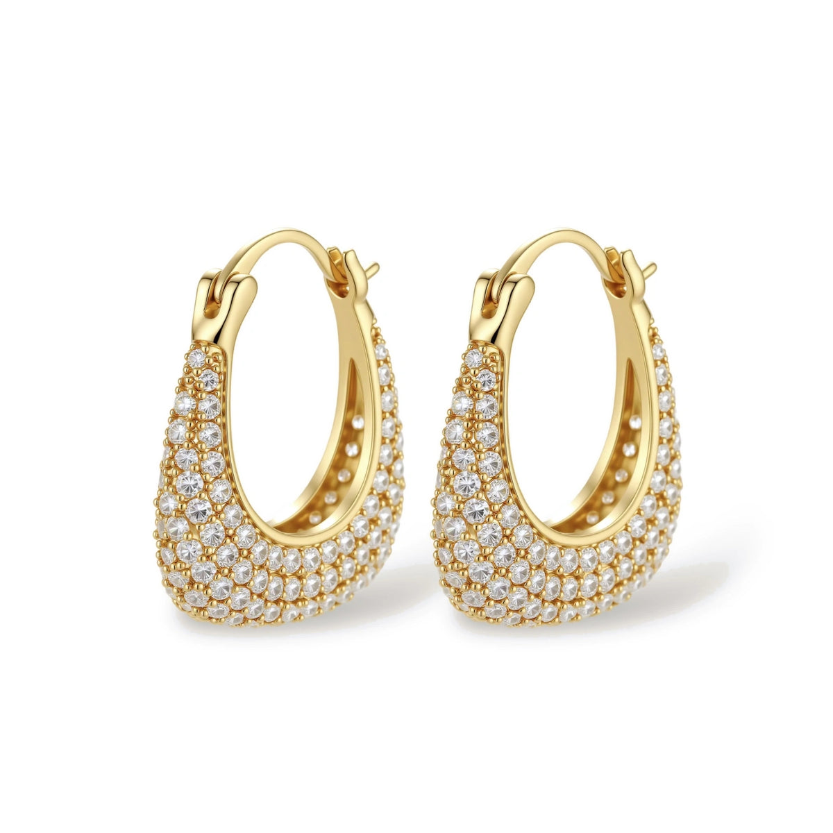 Gold-plated hoop earrings fully covered in sparkling zircon crystals with hinged closure on neutral background