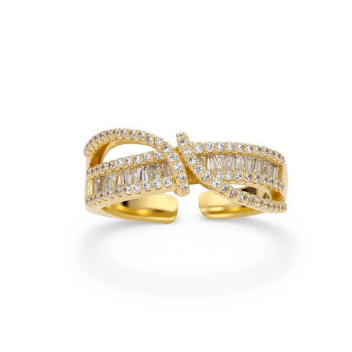 Close-up of gold-plated adjustable ring with crossing bands and sparkling zirconia stones on white background.